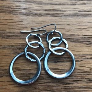 Silver hoop earrings.